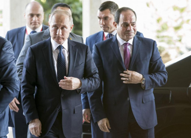 russia 039 s president vladimir putin l and egypt 039 s president abdel fattah al sisi walk during a meeting in cairo photo reuters russia 039 s president vladimir putin l and egypt 039 s president abdel fattah al sisi walk during a meeting in cairo photo reuters