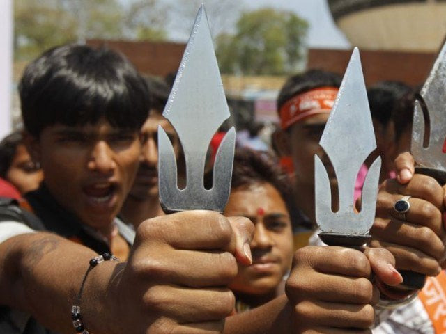 supporters of hardline vishwa hindu parishad vhp hindu group hold tridents photo reuters file supporters of hardline vishwa hindu parishad vhp hindu group hold tridents photo reuters file