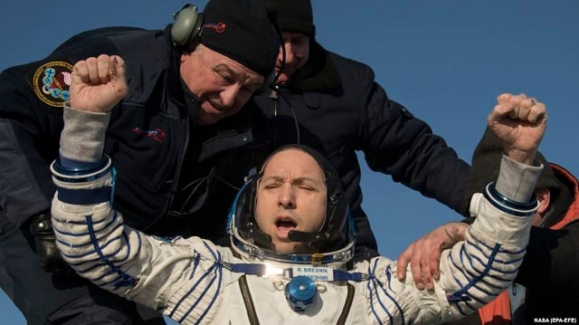 a handout photo made available by nasa shows nasa astronaut randy bresnik being helped out of the soyuz ms 05 spacecraft just minutes after he esa european space agency astronaut paolo nespoli and roscosmos cosmonaut sergey ryazanskiy both not pictured landed in a remote area near the town of zhezkazgan kazakhstan 14 december 2017 photo nasa a handout photo made available by nasa shows nasa astronaut randy bresnik being helped out of the soyuz ms 05 spacecraft just minutes after he esa european space agency astronaut paolo nespoli and roscosmos cosmonaut sergey ryazanskiy both not pictured landed in a remote area near the town of zhezkazgan kazakhstan 14 december 2017 photo nasa