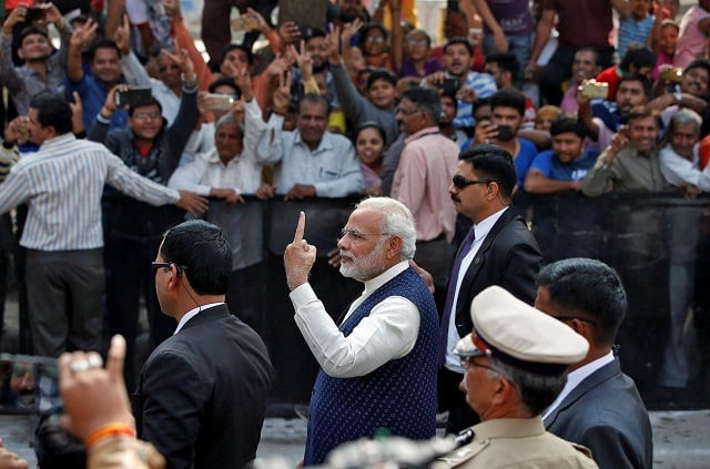india 039 s prime minister narendra modi shows his ink marked finger after casting his vote outside a polling station during the last phase of gujarat state assembly election in ahmedabad india december 14 2017 photo reuters india 039 s prime minister narendra modi shows his ink marked finger after casting his vote outside a polling station during the last phase of gujarat state assembly election in ahmedabad india december 14 2017 photo reuters