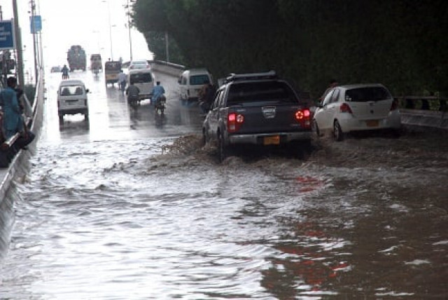 the accumulated water on the city s main thoroughfares is affecting the flow of traffic at different places adding to the difficulties of the daily commuters photo athar khan express the accumulated water on the city s main thoroughfares is affecting the flow of traffic at different places adding to the difficulties of the daily commuters photo athar khan express
