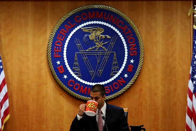 chairman ajit paid drinks coffee ahead of the vote on the repeal of so called net neutrality rules at the federal communications commission in washington us december 14 2017 photo reuters chairman ajit paid drinks coffee ahead of the vote on the repeal of so called net neutrality rules at the federal communications commission in washington us december 14 2017 photo reuters