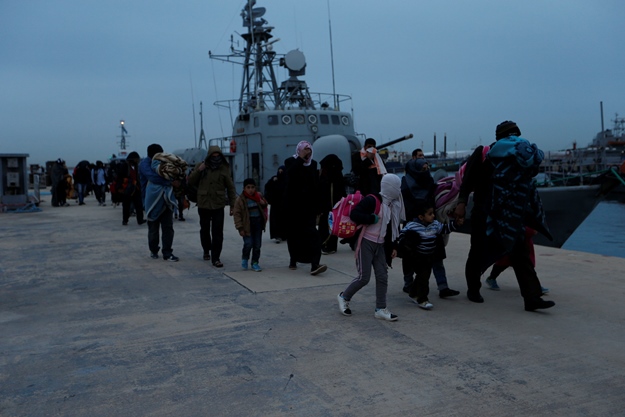 migrants arrive at a naval base after they were rescued by libyan coastguard in tripoli photo reuters