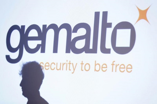 the shadow of an attendee is cast below a logo of franco dutch technology firm gemalto during a news conference in paris february 25 2015 photo reuters