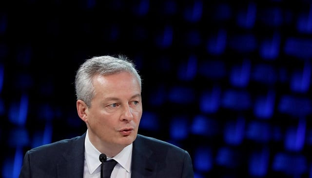 french finance minister bruno le maire delivers a speech as he attends a working session during the one planet summit at the seine musicale center in boulogne billancourt near paris france december 12 2017 photo reuters french finance minister bruno le maire delivers a speech as he attends a working session during the one planet summit at the seine musicale center in boulogne billancourt near paris france december 12 2017 photo reuters