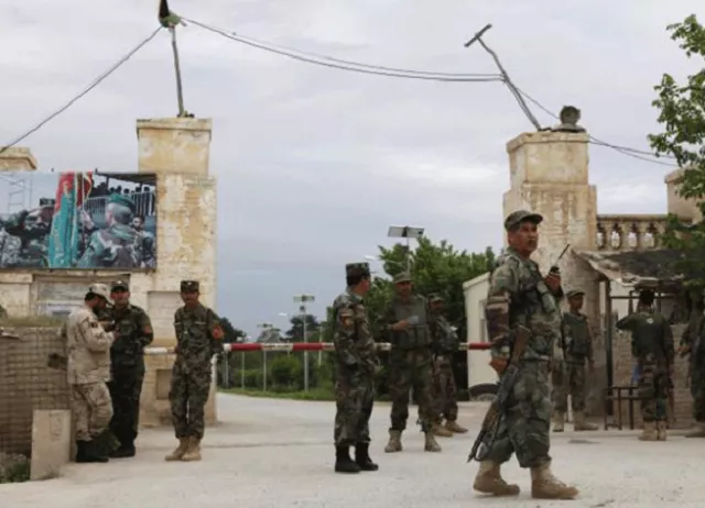 afghan national army ana troops keep watch near the site of an attack on an army headquarters in mazar i sharif northern afghanistan photo reuters afghan national army ana troops keep watch near the site of an attack on an army headquarters in mazar i sharif northern afghanistan photo reuters