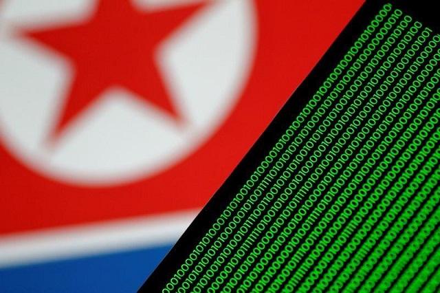 binary code is seen on a screen against a north korean flag in this illustration photo november 1 2017 photo reuters