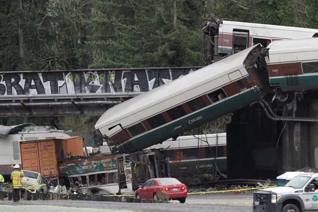 the scene where an amtrak passenger train derailed on a bridge over interstate highway i 5 in dupont washington us december 18 2017 photo reuters