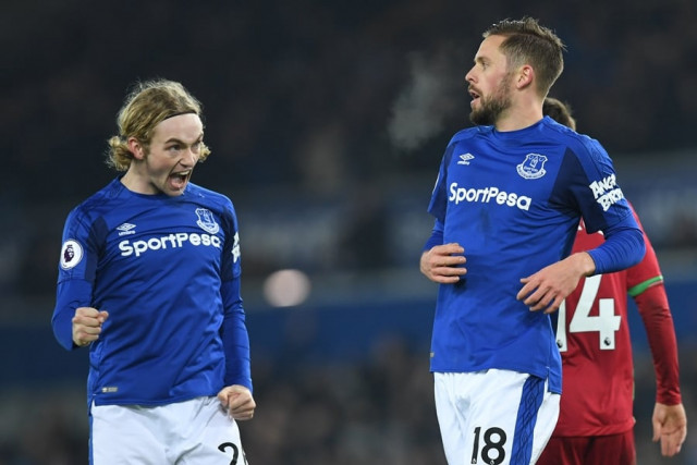 everton 039 s icelandic midfielder gylfi sigurdsson r celebrates scoring the second goal with everton 039 s english midfielder tom davies during the english premier league football match between everton and swansea city at goodison park in liverpool north west england on december 18 2017 photo afp everton 039 s icelandic midfielder gylfi sigurdsson r celebrates scoring the second goal with everton 039 s english midfielder tom davies during the english premier league football match between everton and swansea city at goodison park in liverpool north west england on december 18 2017 photo afp