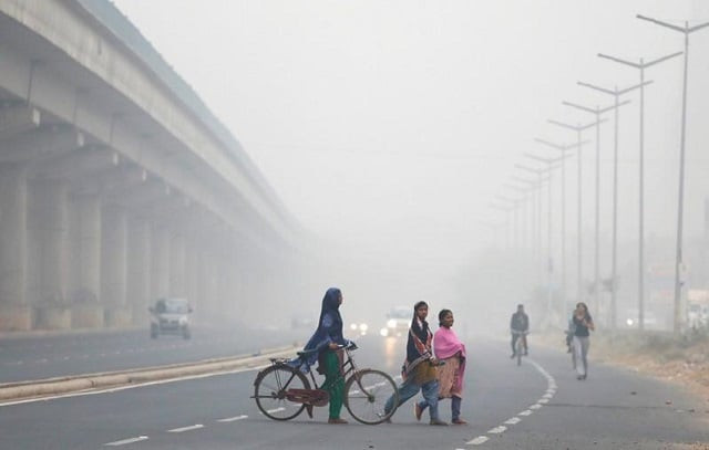 file photo people cross the road in delhi india november 7 2017 photo reuters file photo people cross the road in delhi india november 7 2017 photo reuters