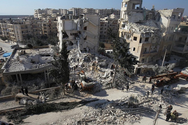 file photo people inspect the damage at a site hit by airstrikes in the rebel held city of idlib syria february 7 2017 photo reuters