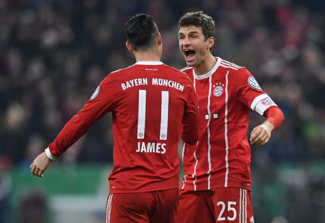 bayern munich 039 s striker thomas mueller r is conngratulated by his teammate colombian james rodriguez l after scoring the second goal during the german football cup dfb pokal round of sixteen match bayern munich vs borussia dortmund on december 20 2017 in munich bayern munich 039 s striker thomas mueller r is cnongratulated by his teammate colombian james rodriguez l after scoring the second goal during the german football cup dfb pokal round of sixteen match bayern munich vs borussia dortmund on december 20 2017 in munich photo afp bayern munich 039 s striker thomas mueller r is conngratulated by his teammate colombian james rodriguez l after scoring the second goal during the german football cup dfb pokal round of sixteen match bayern munich vs borussia dortmund on december 20 2017 in munich bayern munich 039 s striker thomas mueller r is cnongratulated by his teammate colombian james rodriguez l after scoring the second goal during the german football cup dfb pokal round of sixteen match bayern munich vs borussia dortmund on december 20 2017 in munich photo afp