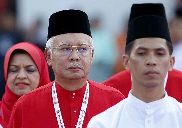 file photo malaysia 039 s prime minister najib razak inspects the united malays national organisation umno youth during the annual assembly at the putra world trade centre in kuala lumpur malaysia december 10 2015 photo reuters