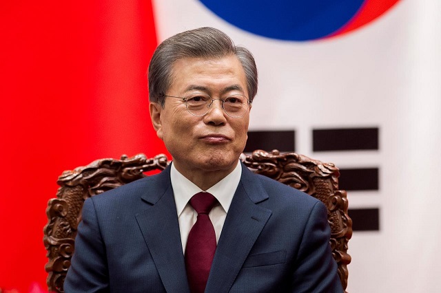 south korean president moon jae in sits next to chinese president xi jinping not seen during a signing ceremony at the great hall of the people in beijing china december 14 2017 photo reuters