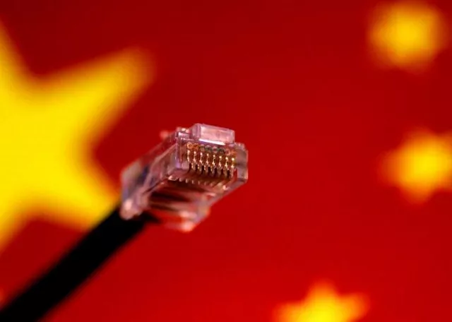 a computer network cable is seen above a chinese flag in this july 12 2017 illustration photo photo reuters a computer network cable is seen above a chinese flag in this july 12 2017 illustration photo photo reuters