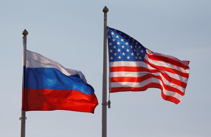 national flags of russia and the us fly at vnukovo international airport in moscow russia photo reuters