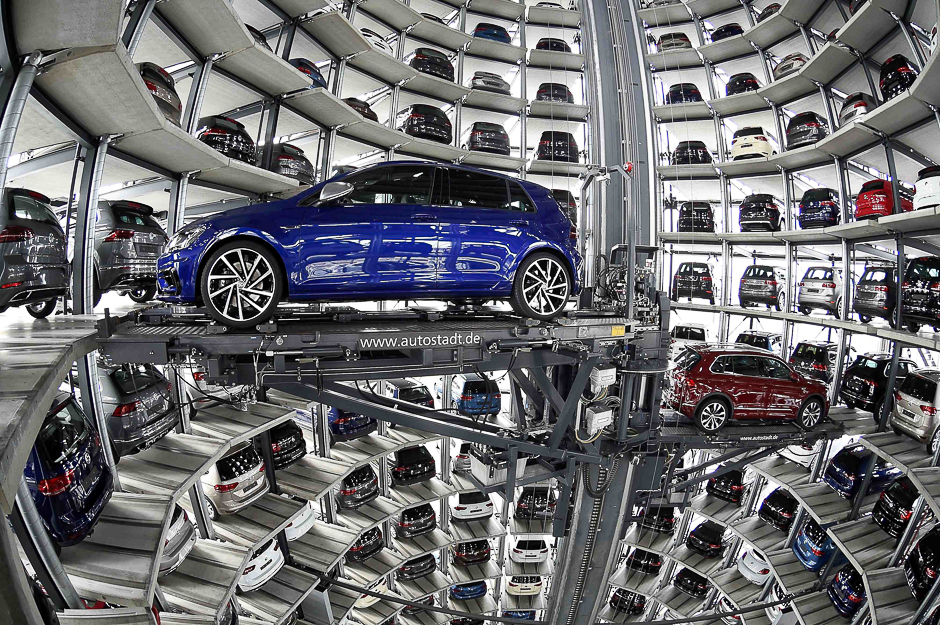 vw golfs are loaded in a delivery tower at the plant of german carmaker volkswagen in wolfsburg germany photo reuters