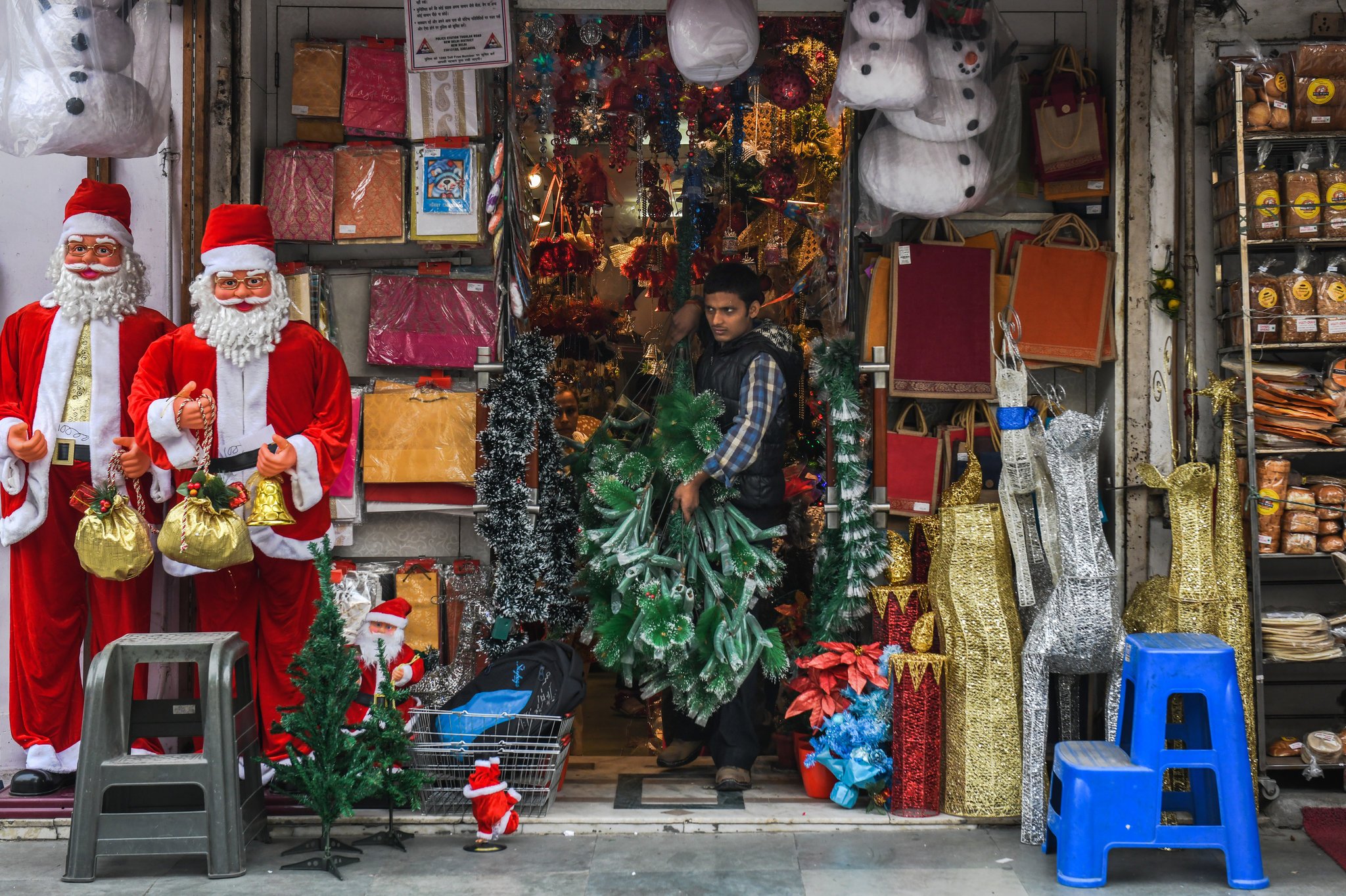 outside a store in delhi one christmas shopper said she viewed the holiday as a chance to instill the principle of national integration in her daughter photo the new york times