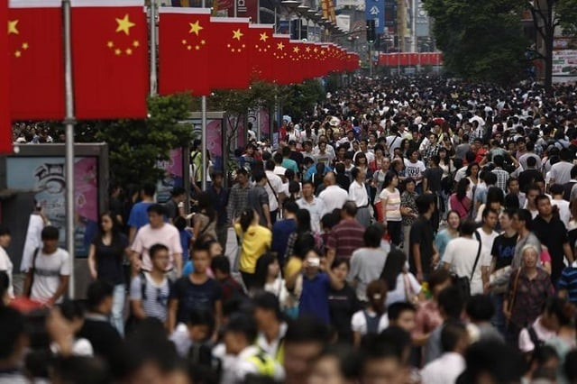 file photo people walk along nanjing road during the first day of china 039 s national day in shanghai october 1 2013 photo reuters file photo people walk along nanjing road during the first day of china 039 s national day in shanghai october 1 2013 photo reuters