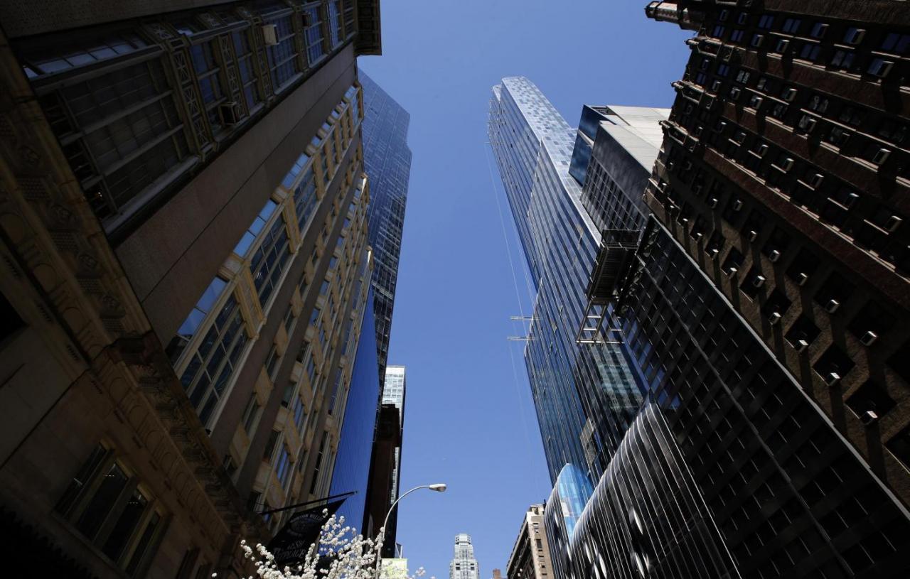 one57 a new luxury skyscraper apartment building designed by french architect christian de portzamparc which is under construction on new york city 039 s west 57th street is pictured april 24 2014 wealthy chinese are pouring money into real estate in new york and some other major cities around the world including london and sydney as they seek safe havens for their cash and also establish a base for their children to get an education in the west the current in vogue building among the chinese is central park s one57 a new skyscraper designed by pritzker prize winning french architect de portzamparc where they can spend 18 85 million for a three bedroom or 55 million for an apartment taking up the entire 81st floor the building comes with all of the amenities of a five star hotel photo reuters