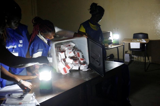 polling staff start to count the ballots for the liberian presidential election at a polling station in monrovia liberia december 26 2017 photo reuters