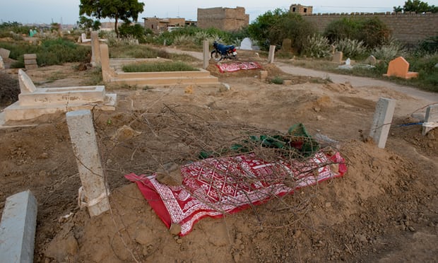 the graves of ghani rehman 17 and bakhtaja 15 in ali brohi goth karachi photo courtesy the guardian