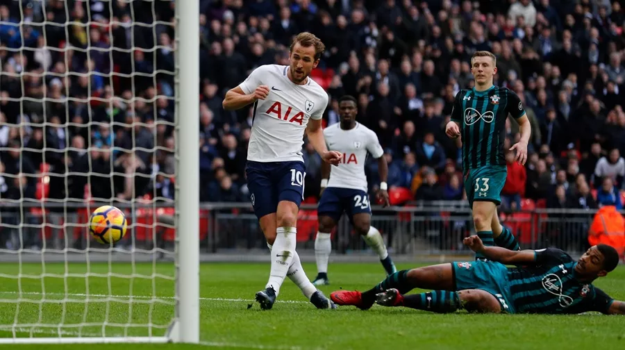tottenham hotspur 039 s english striker harry kane c scores his team 039 s and his second goal of the english premier league football match between tottenham hotspur and southampton at wembley stadium in london on december 26 2017 harry kane beat alan shearer s 36 goal record for the most premier league goals scored in a calendar year after scoring during tottenham s game against southampton photo afp tottenham hotspur 039 s english striker harry kane c scores his team 039 s and his second goal of the english premier league football match between tottenham hotspur and southampton at wembley stadium in london on december 26 2017 harry kane beat alan shearer s 36 goal record for the most premier league goals scored in a calendar year after scoring during tottenham s game against southampton photo afp