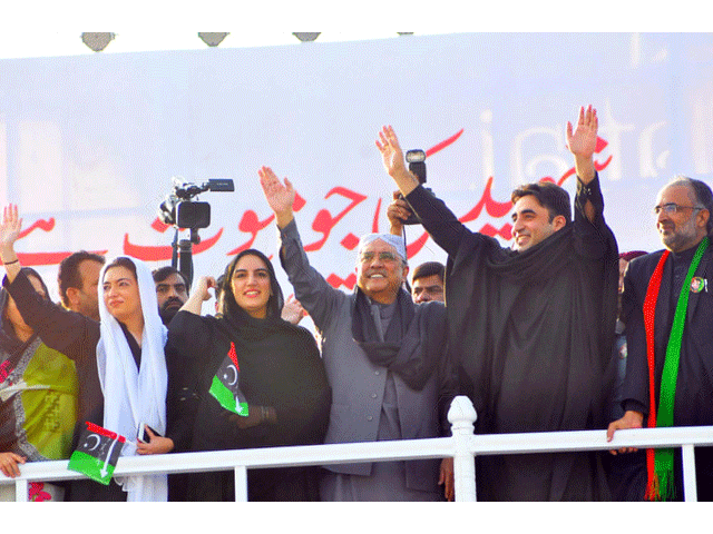 chairman ppp bilawal bhutto former president asif ali zardari and other leaders greet supporters during a progression to mark 10th death anniversary of slain former premier benazir bhutto at garhi khuda bux larkana on december 27 2017 photo ppi