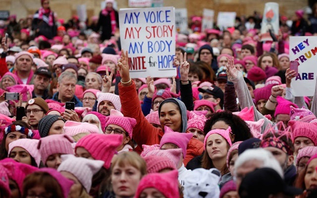 file photo millions around the world marched in protest to trump the day after his inauguration wearing pink 039 pussyhats 039 in reference to his boast in a 2005 video about grabbing women 039 s genitals photo reuters