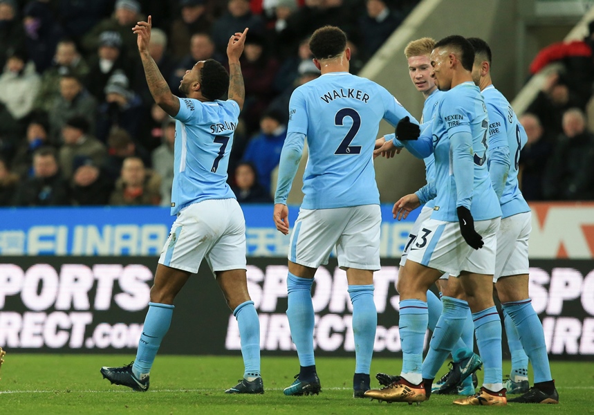 manchester city 039 s english midfielder raheem sterling l celebrates scoring the opening goal during the english premier league football match between newcastle united and manchester city at st james 039 park in newcastle upon tyne north east england on december 27 2017 photo afp