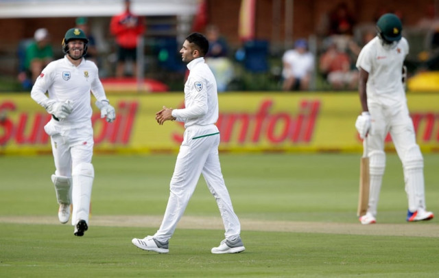 south african bowler keshav maharaj c celebrates the dismissal of zimbabwean batsman blessing muzarabani r during the second day of the day night test cricket match between south africa and zimbabwe at st george 039 s park cricket ground in port elizabeth on december 27 2017 zimbabwe were forced to follow on after being bowled out for 68 on the second day of their one off day night test against south africa photo afp south african bowler keshav maharaj c celebrates the dismissal of zimbabwean batsman blessing muzarabani r during the second day of the day night test cricket match between south africa and zimbabwe at st george 039 s park cricket ground in port elizabeth on december 27 2017 zimbabwe were forced to follow on after being bowled out for 68 on the second day of their one off day night test against south africa photo afp