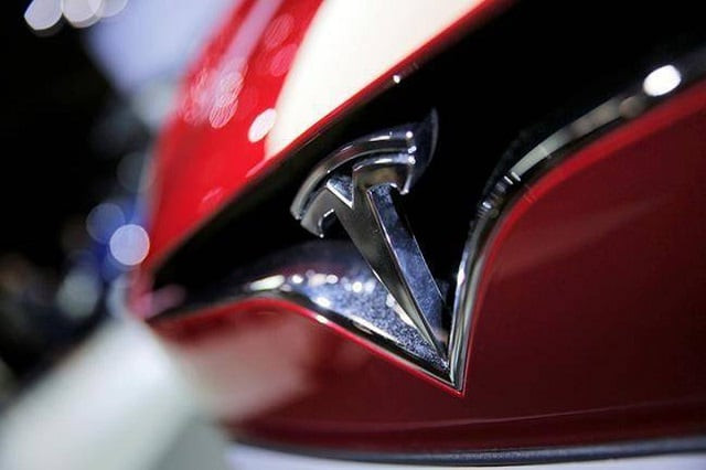 elon musk says tesla to make pickup truck after model y crossover photo ap elon musk says tesla to make pickup truck after model y crossover photo ap