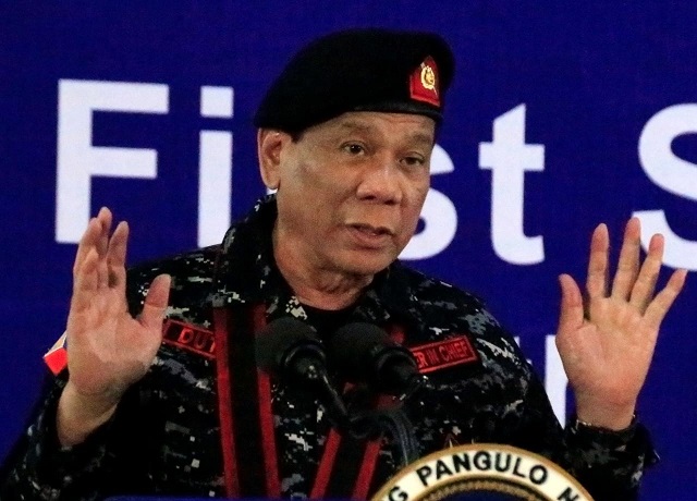 file photo philippine president rodrigo duterte wearing a military uniform gestures as he delivers a speech during the 67th founding anniversary of the first scout ranger regiment in san miguel town bulacan province north of manila philippines november 24 2017 photo reuters