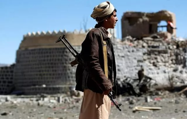 an armed yemeni inspects the damage following a reported saudi led coalition air strike on south sanaa photo afp an armed yemeni inspects the damage following a reported saudi led coalition air strike on south sanaa photo afp