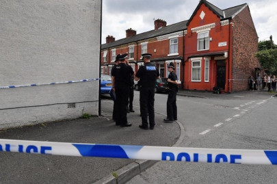 man dies after bursting into flames on street in uk