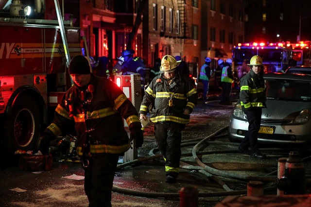 fire department of new york fdny personnel work on the scene of an apartment fire in bronx new york us december 28 2017 photo reuters