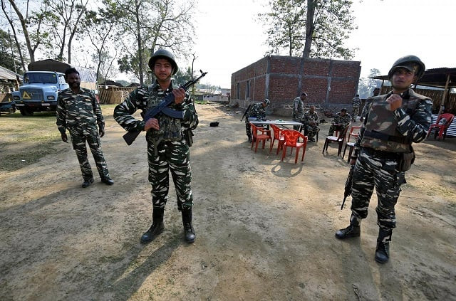 central reserve police force crpf personnel stand guard at a temporary camp ahead of the publication of the first draft of the national register of citizens nrc in the juria village of nagaon district in the northeastern state of assam india december 28 2017 photo reuters central reserve police force crpf personnel stand guard at a temporary camp ahead of the publication of the first draft of the national register of citizens nrc in the juria village of nagaon district in the northeastern state of assam india december 28 2017 photo reuters
