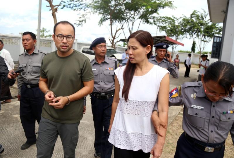 cameraman lau hon meng from singapore l and reporter mok choy lin from malaysia arrive for their first appearance in the court after they were detained for attempting to fly a drone near parliament in the capital naypyitaw myanmar photo reuters