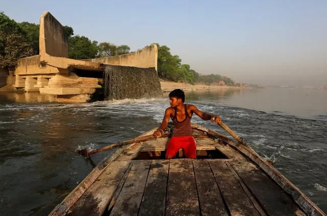 file photo untreated sewage flows from an open drain into the river ganges in kanpur india april 4 2017 photo reuters file photo untreated sewage flows from an open drain into the river ganges in kanpur india april 4 2017 photo reuters