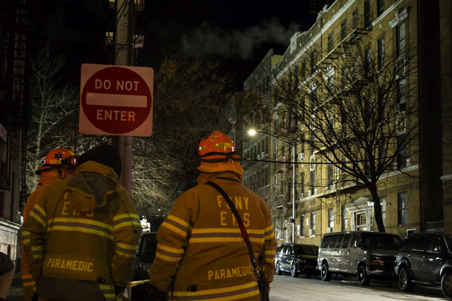 firefighters put out a major house fire on prospect avenue on december 29 2017 in the bronx borough of new york city photo afp