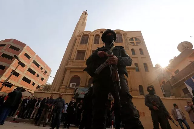 security forces stand guard at the site of attack on a church in the helwan district south of cairo egypt december 29 2017 photo reuters security forces stand guard at the site of attack on a church in the helwan district south of cairo egypt december 29 2017 photo reuters