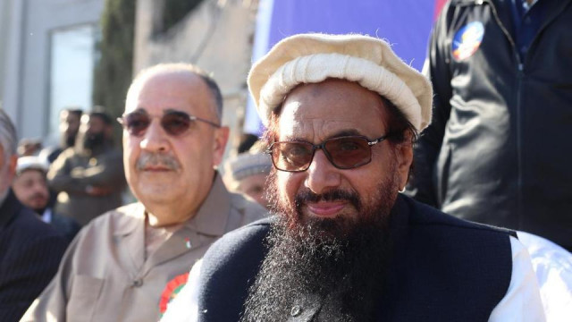 hafiz saeed share the stage with palestinian envoy photo courtesy hindustan times hafiz saeed share the stage with palestinian envoy photo courtesy hindustan times