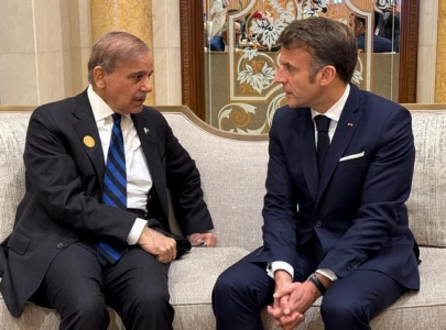 pm meets french president agrees to enhance cooperation in key sectors