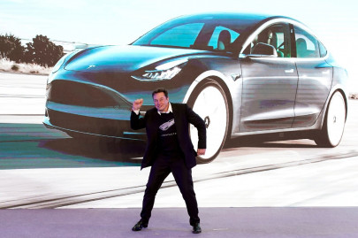 dancing elon musk hands drivers first teslas from germany s new gigafactory dancing elon musk hands drivers first teslas from germany s new gigafactory