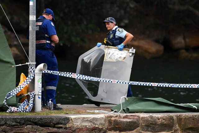 an australian policewoman holds a piece of debris from a seaplane that crashed on sunday killing six people at apple tree bay located on the hawkesbury river north of sydney in australia december 31 2017 photo supplied by third party to reuters an australian policewoman holds a piece of debris from a seaplane that crashed on sunday killing six people at apple tree bay located on the hawkesbury river north of sydney in australia december 31 2017 photo supplied by third party to reuters