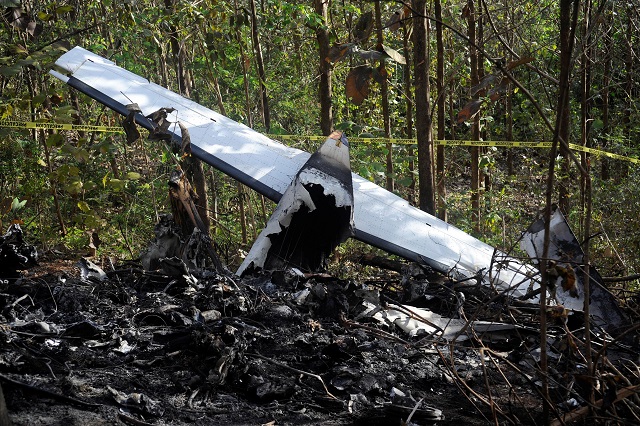 pieces of a burned aircraft is seen at the site where the plane crashed in the mountainous area of punta islita in the province of guanacaste costa rica january 1 2018 photo via reuters