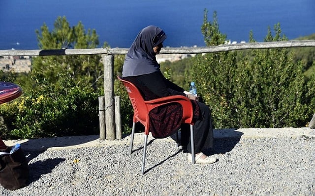 linda an algerian mother of three who was abandoned by her husband after being diagnosed with breast cancer in algiers on november 15 2017 photo afp