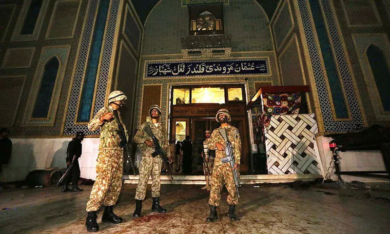 soldiers stand guard outside lal shahbaz qalandar 039 s shrine photo app soldiers stand guard outside lal shahbaz qalandar 039 s shrine photo app