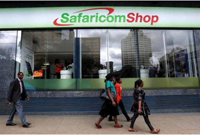 pedestrians walk past a mobile phone care centre operated by kenyan 039 s telecom operator safaricom in the central business district of kenya 039 s capital nairobi may 11 2016 photo reuters pedestrians walk past a mobile phone care centre operated by kenyan 039 s telecom operator safaricom in the central business district of kenya 039 s capital nairobi may 11 2016 photo reuters