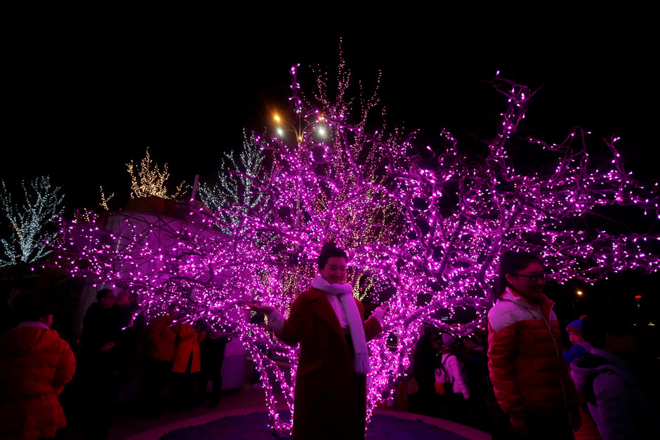 People visit a light show celebrating the Lantern Festival, the last day of Chinese Lunar New Year celebrations, in Beijing. PHOTO: REUTERS